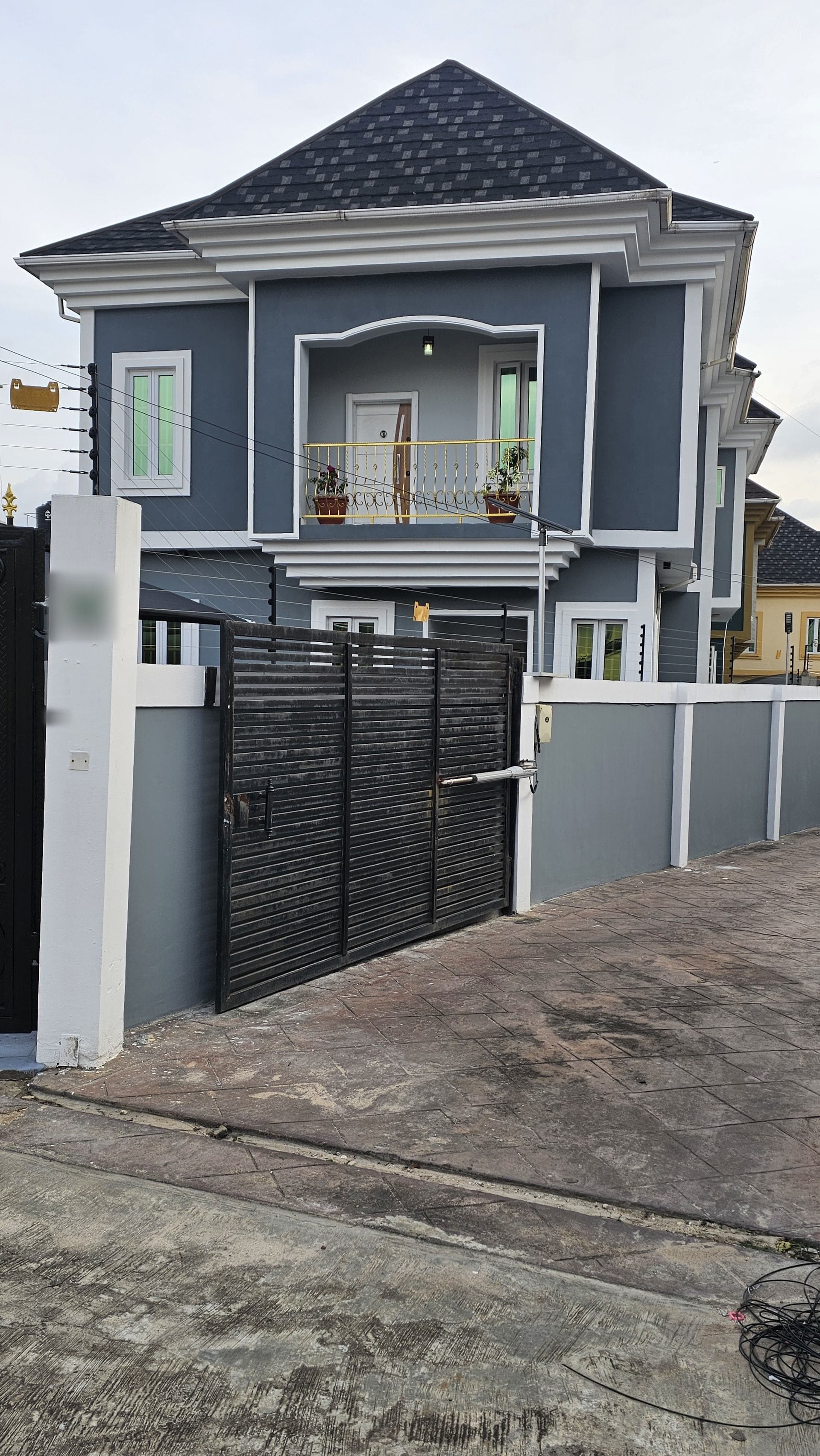 Completed residence with gate and boundary wall